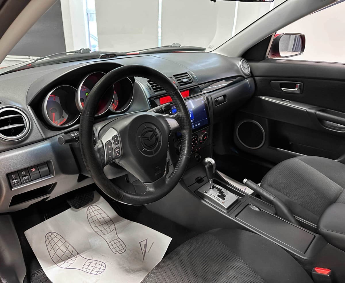 Mazda 3 - фото 10
