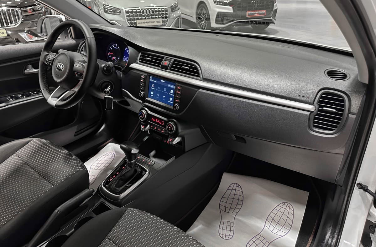 Kia Rio X-Line - фото 16