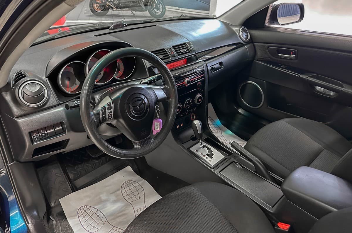Mazda 3 - фото 10