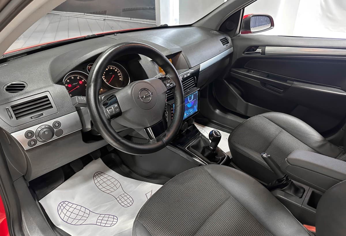 Opel Astra - фото 16