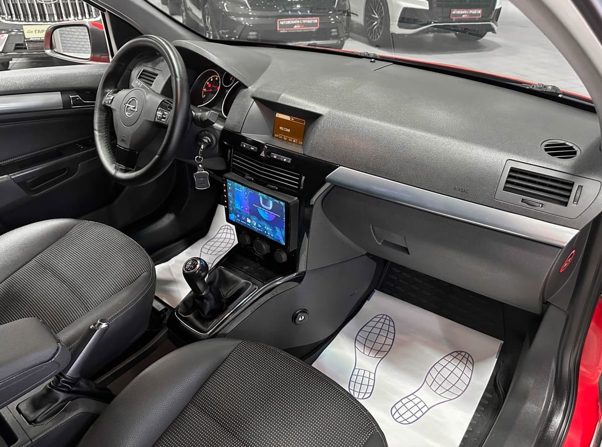 Opel Astra - фото 10
