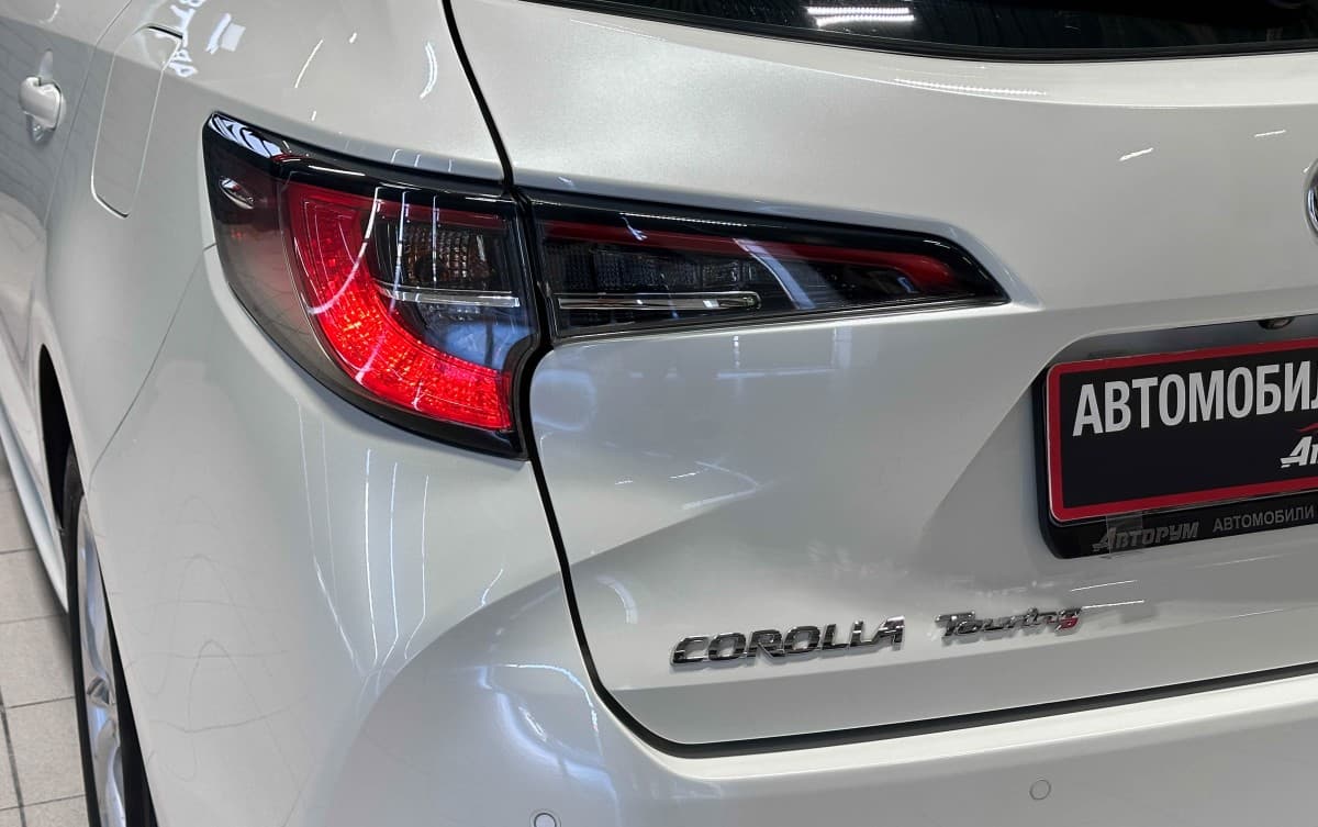 Toyota Corolla Touring - фото 7
