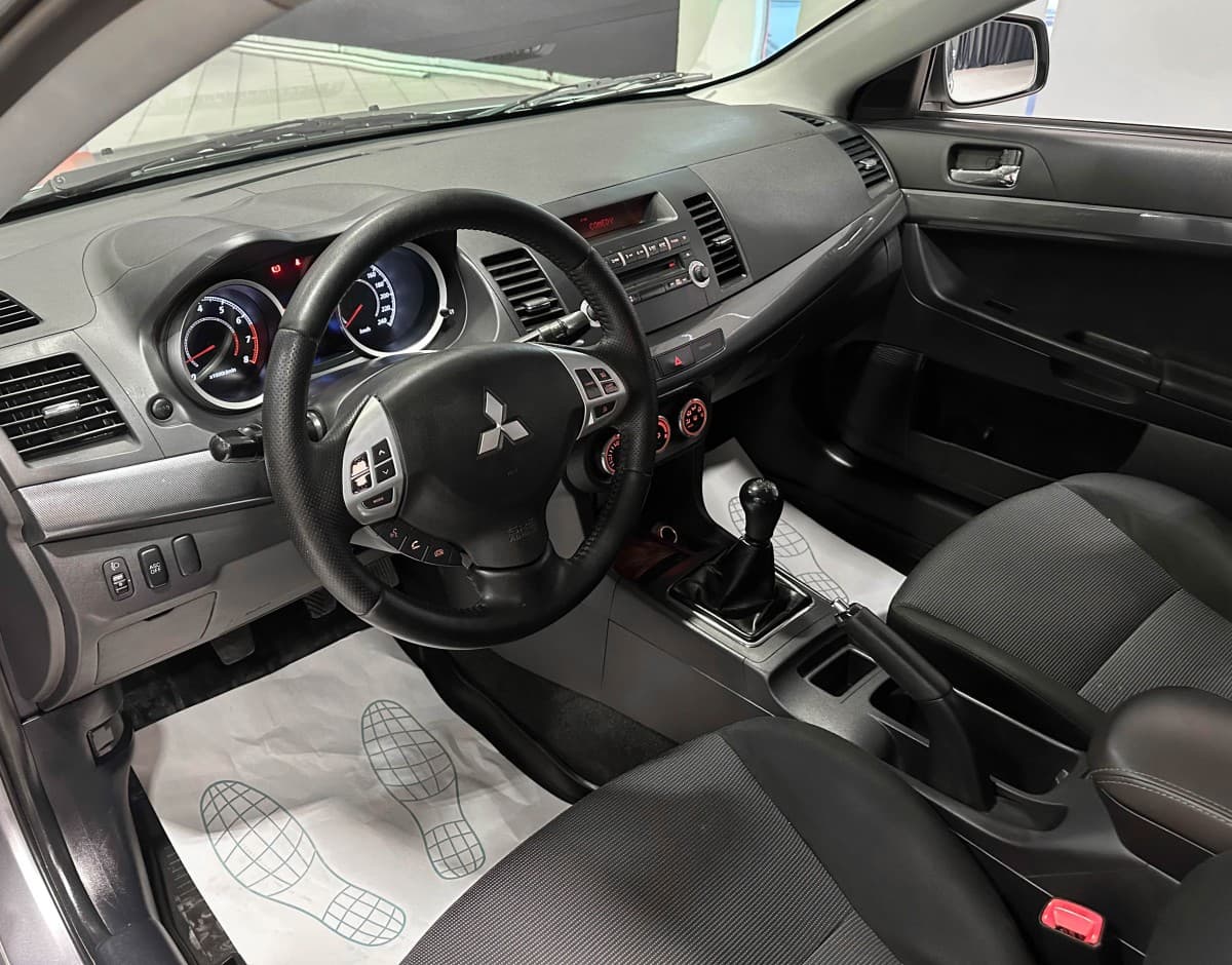 Mitsubishi Lancer - фото 10